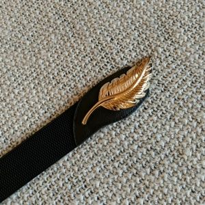 Black elastic belt with gold accent